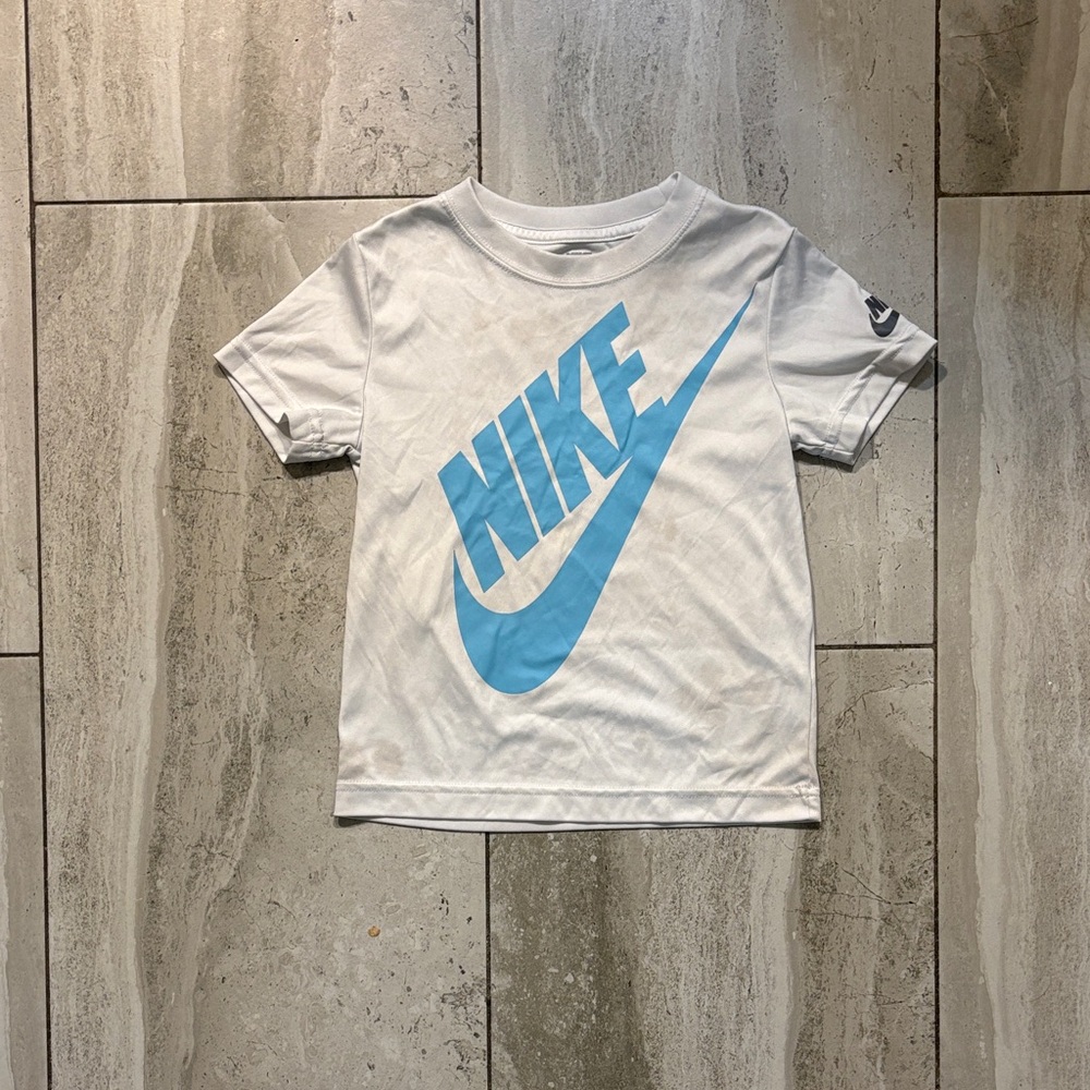 Nike White Tee with Sky Blue Swoosh Logo